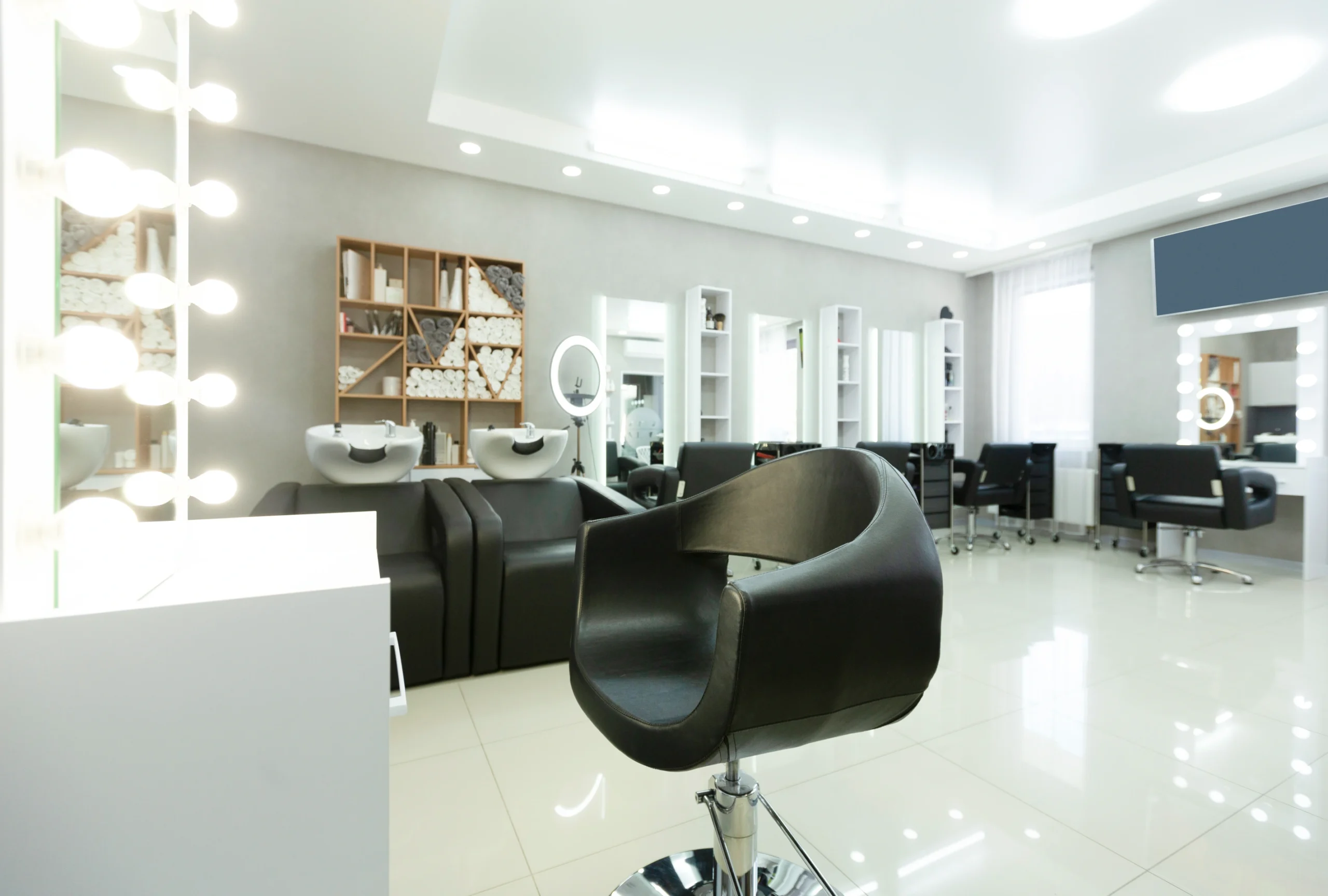 barber-chair-and-backlit-mirror-in-bright-interior-2026-03-24-02-20-12-utc